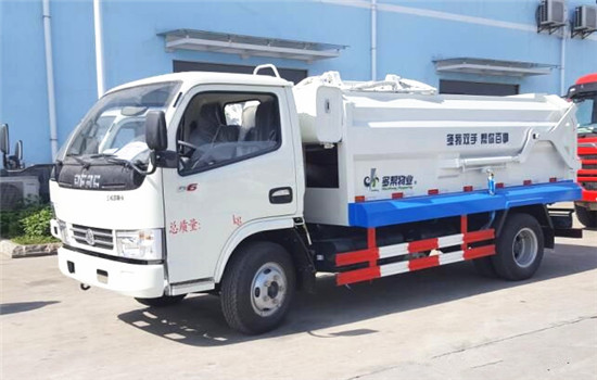 東風小多利卡側(cè)裝壓縮式對接垃圾車(5立方)圖片